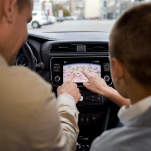 boy-dad-near-electric-car_23-2149171034 boy-dad-near-electric-car_23-2149171034