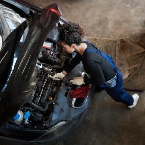 top-view-woman-repairing-car_23-2150171260 top-view-woman-repairing-car_23-2150171260